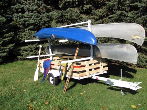 #UCT4 - 4 PLACER CANOE TRAILER WITH SWING A WAY TONGUE EXTENDER