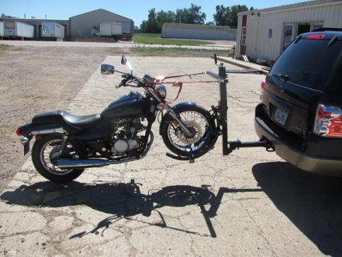 TOW YOUR MOTORCYCLE FROM YOUR RECEIVER HITCH.